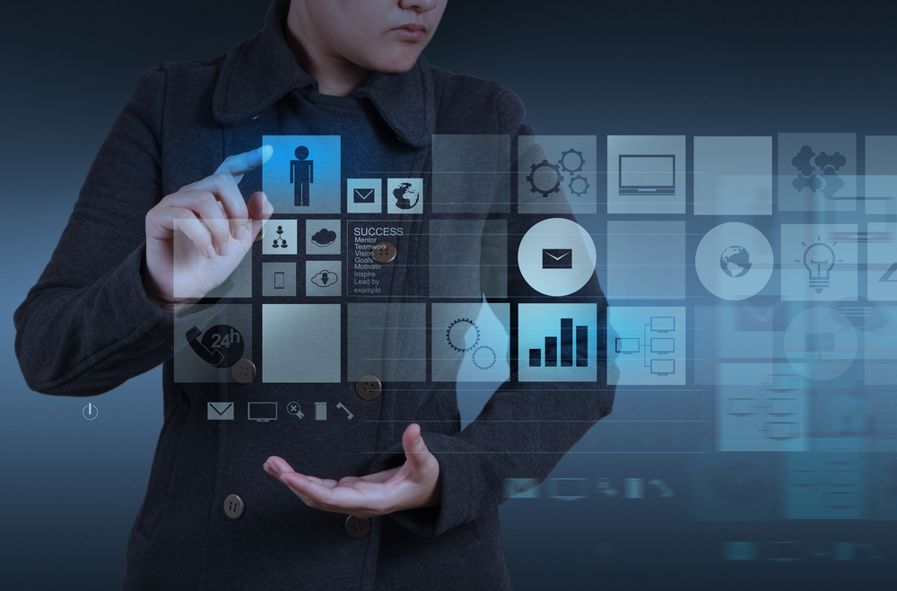 Website designer working with the new computer interface as design concept